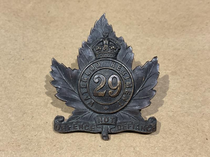 Gradia Militaria -  WW1 C.E.F 29th Waterloo Regt cap badge by Gaunt