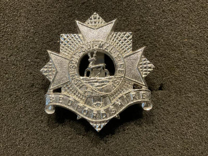 Gradia Militaria -  Anodised Bedfordshire Regiment cap badge