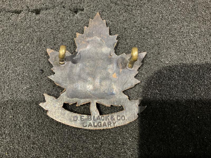 WW1 CEF 82nd Calgary Battalion cap badge by BLACK