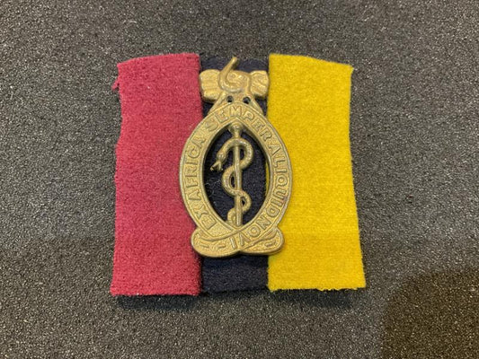 Gradia Militaria -  WW2 East Africa Medical Corps cap badge & backing