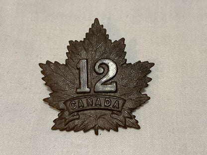Gradia Militaria -  WW1 CEF 12th Infantry Battalion cap badge