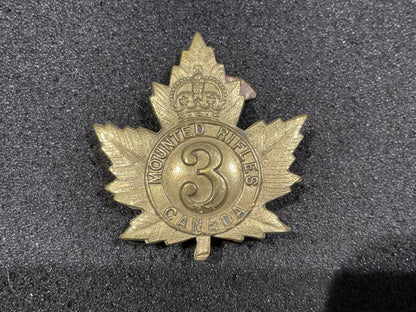 Gradia Militaria -  WW1 CEF 3rd Canadian Mounted Rifles cap badge