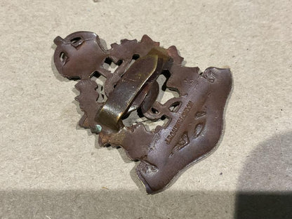 WW2 R.C.A.M.C bronze O.S.D cap badge by GAUNT