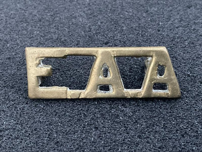 Gradia Militaria -  WW2 E.A.A-East Africa Artillery brass shoulder title