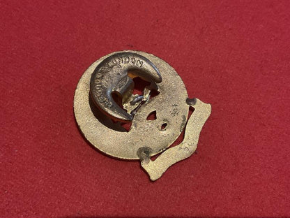 Middlesex Regiment D.C.O gilt & enamel lapel badge