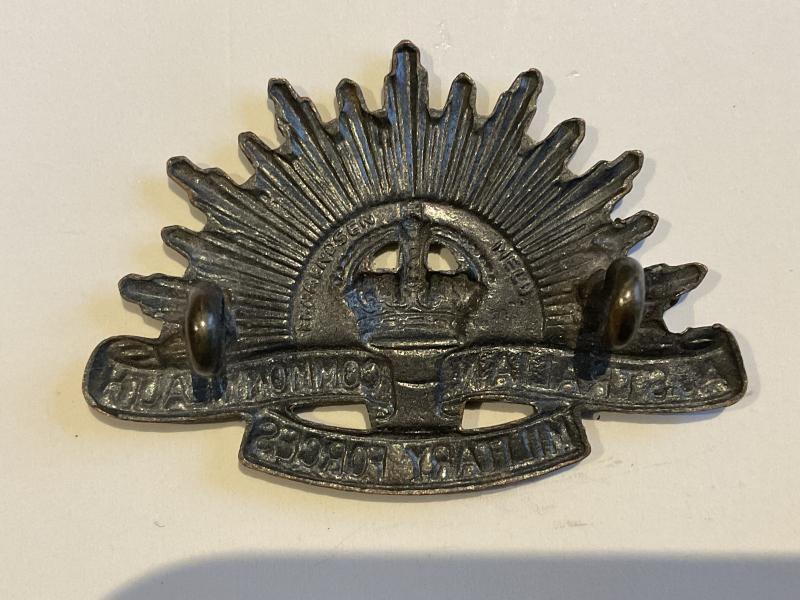 WW2 Australian Rising sun collar badge by H.ARENDSEN