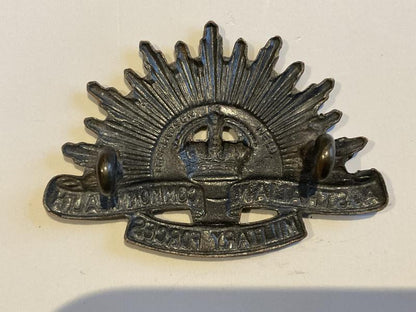 WW2 Australian Rising sun collar badge by H.ARENDSEN