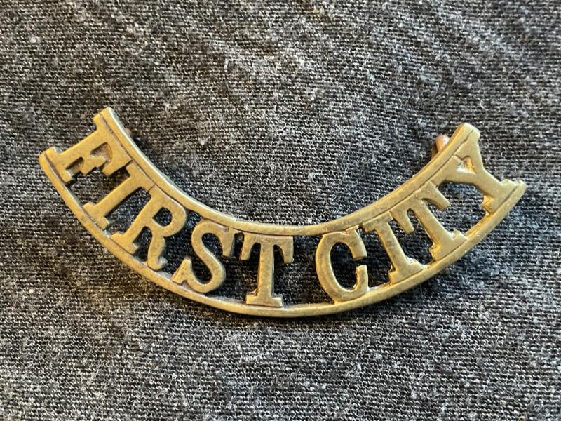 Gradia Militaria -  South African First City  brass shoulder title 1932-60