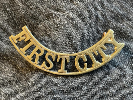 Gradia Militaria -  South African First City  brass shoulder title 1932-60
