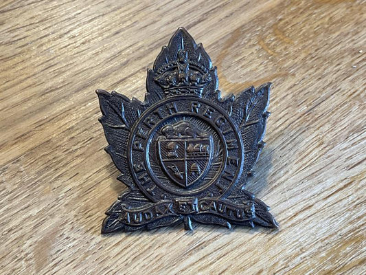 Gradia Militaria -  Canadian; The Perth Regiment cap badge.