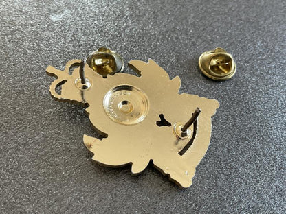 Anodised Australian Intelligence Corps hat badge.