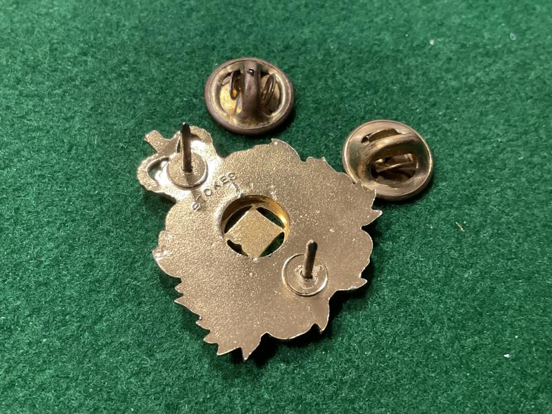 Royal Queensland Regiment collar badge by STOKES.