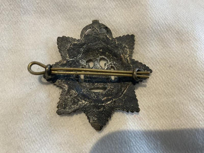 WW2 Theatre made The Devonshire Regiment cap badge