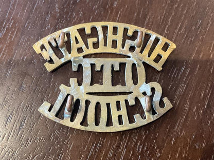 Highgate school O.T.C brass shoulder title.