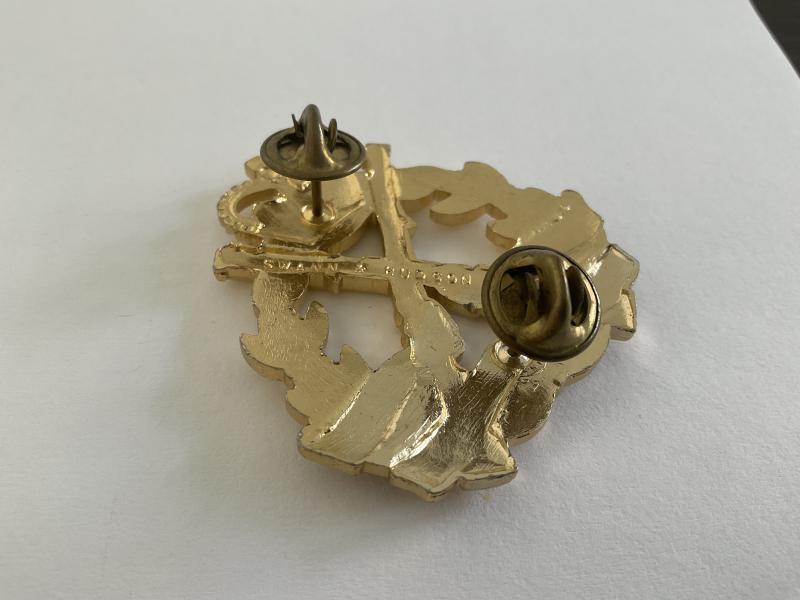 1960s Royal Australian Infantry Corps anodised cap badge.