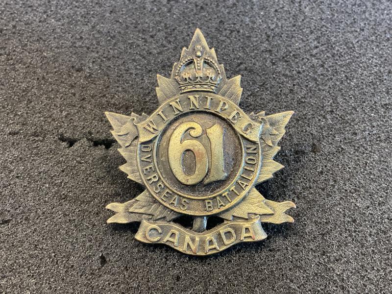 Gradia Militaria -  WW1 C.E.F 61st Infantry Battalion Winnipeg¬¨√Ñ¬¨√π cap badge