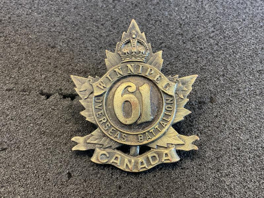Gradia Militaria -  WW1 C.E.F 61st Infantry Battalion Winnipeg¬¨√Ñ¬¨√π cap badge