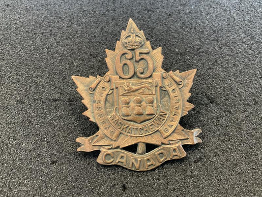 Gradia Militaria -  WW1 C.E.F 65th Inf Saskatchewan Battalion¬¨√Ñ¬¨√π cap badge.