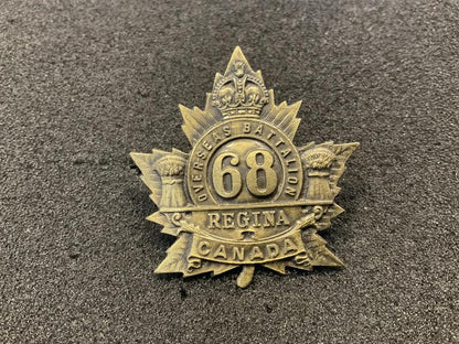 Gradia Militaria -  WW1 C.E.F 68th Infantry Battalion cap badge.