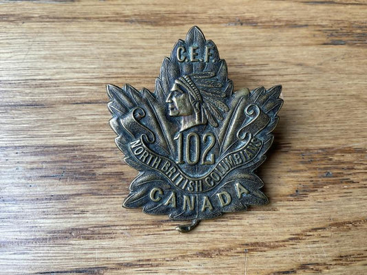 Gradia Militaria -  WW1 C.E.F 102nd Battalion, North British Colombians cap badge.