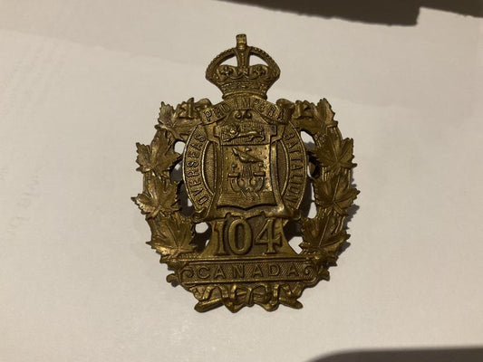 Gradia Militaria -  WW1 C.E.F 104th Infantry Battalion cap badge by C & S Co