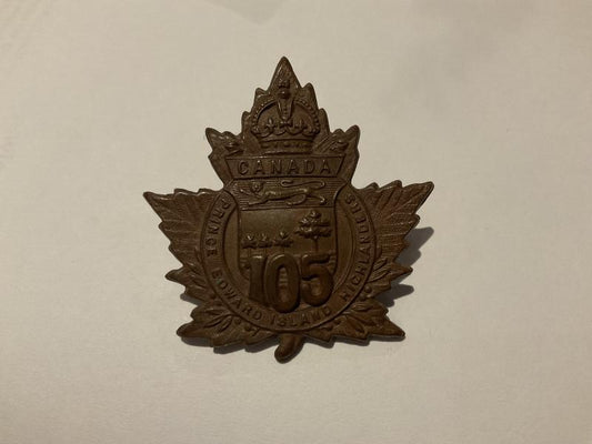 Gradia Militaria -  WW1 C.E.F 105th Infantry Battalion cap badge.