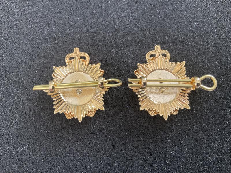 Officers Royal Logistics Corps collar badges.