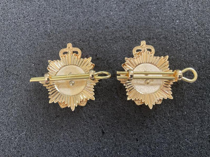 Officers Royal Logistics Corps collar badges.