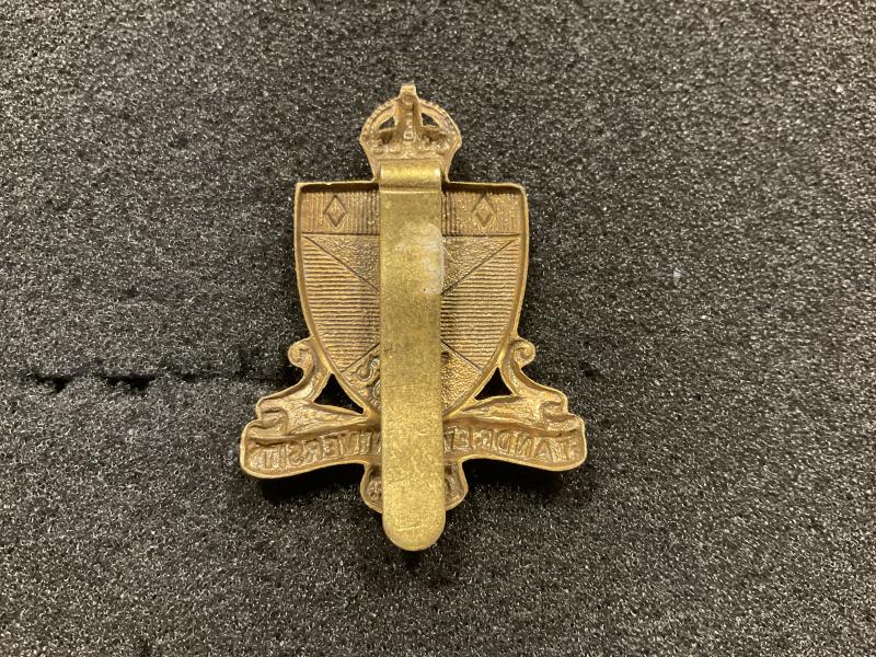 St Andrews O.T.C cap badge.