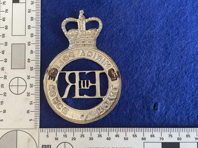 Q/C Royal Dominica Police Force helmet plate.