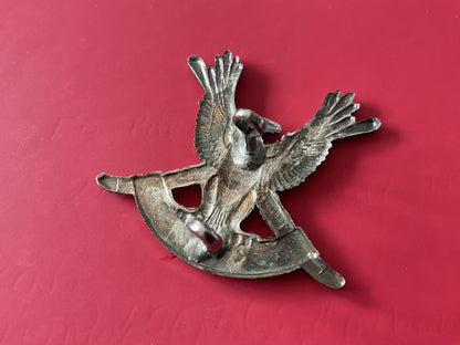 Omani; Desert Regiment Officers cap badge.
