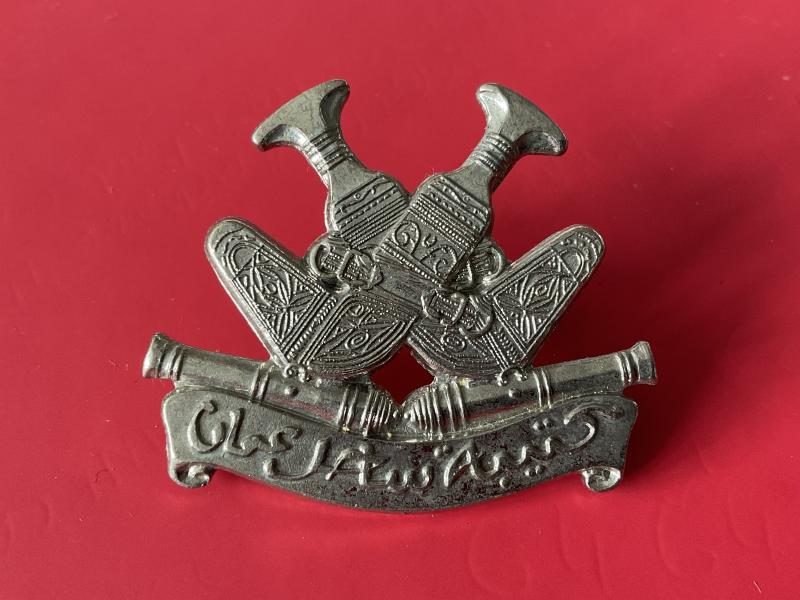 Gradia Militaria -  Oman Coast Regiment cap badge.