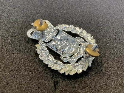 Q/C Bermuda Police cap badge.