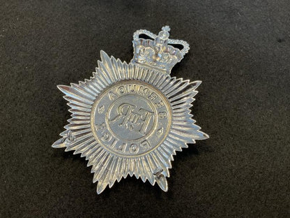 Q/C Bermuda Police Helmet plate.