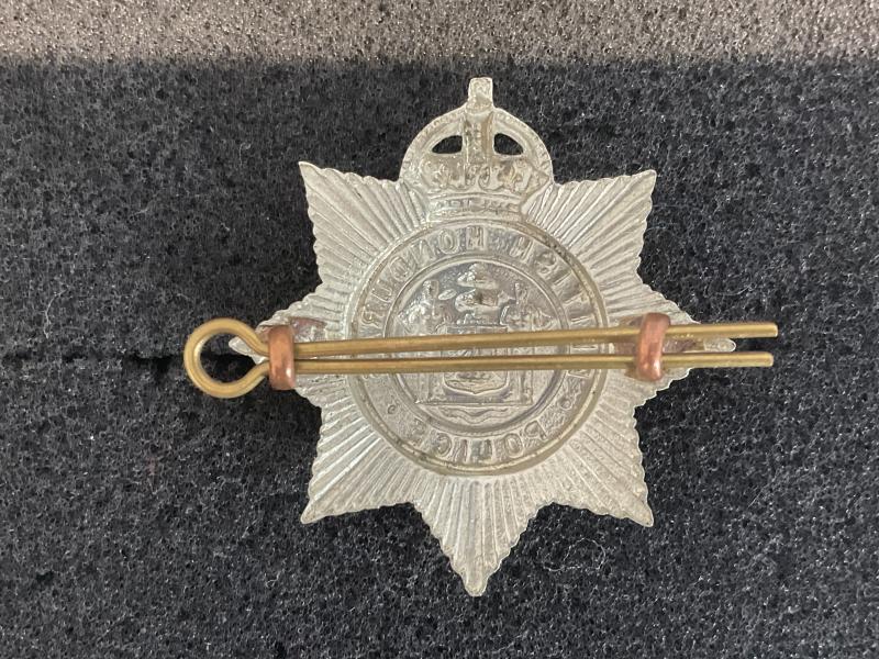 K/C British Honduras Police cap badge.