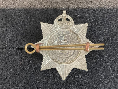 K/C British Honduras Police cap badge.