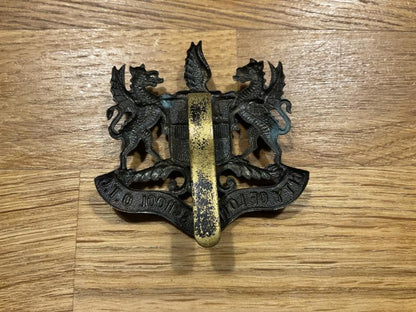 Pre 1948 City of London School O.T.C cap badge.