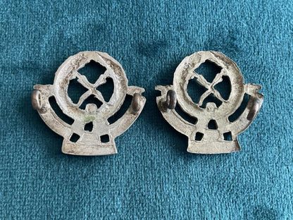 1940-50s Federation of Malaya Police collar badges.