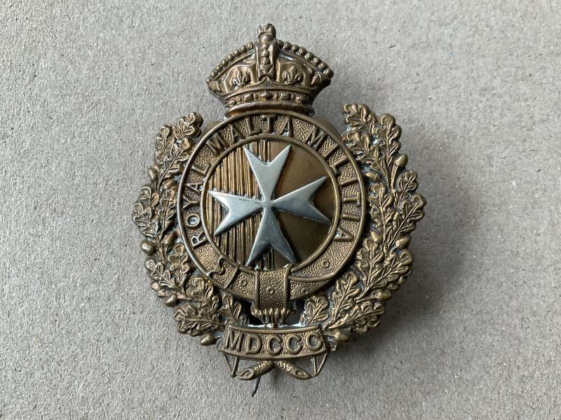 Gradia Militaria -  QVC Royal Malta Militia 1889-1903 cap badge.