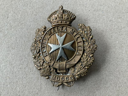 Gradia Militaria -  QVC Royal Malta Militia 1889-1903 cap badge.