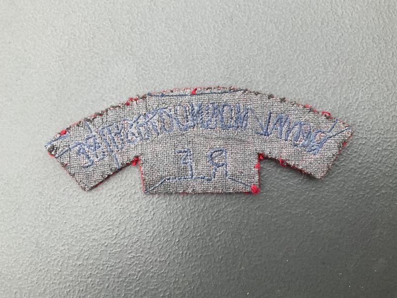 Royal Monmouthshire Royal Engineers shoulder title.