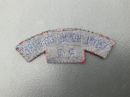 Royal Monmouthshire Royal Engineers shoulder title.