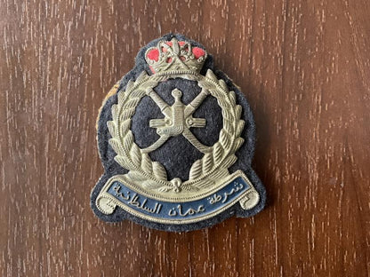 Gradia Militaria -  Oman Police cap badge, early example.