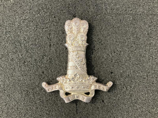 Gradia Militaria -  11th Hussars silver plated (P on rear) NCOs sleeve badge.