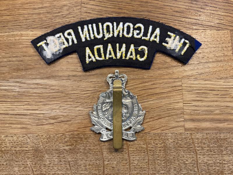 The Algonquin Regt of Canada cap badge & shoulder title.