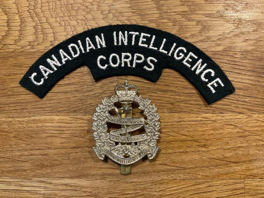 Gradia Militaria -  Canadian Intelligence Corps cap badge & shoulder title.