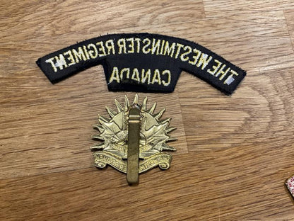The Westminster Regiment of Canada cap badge & shoulder title.