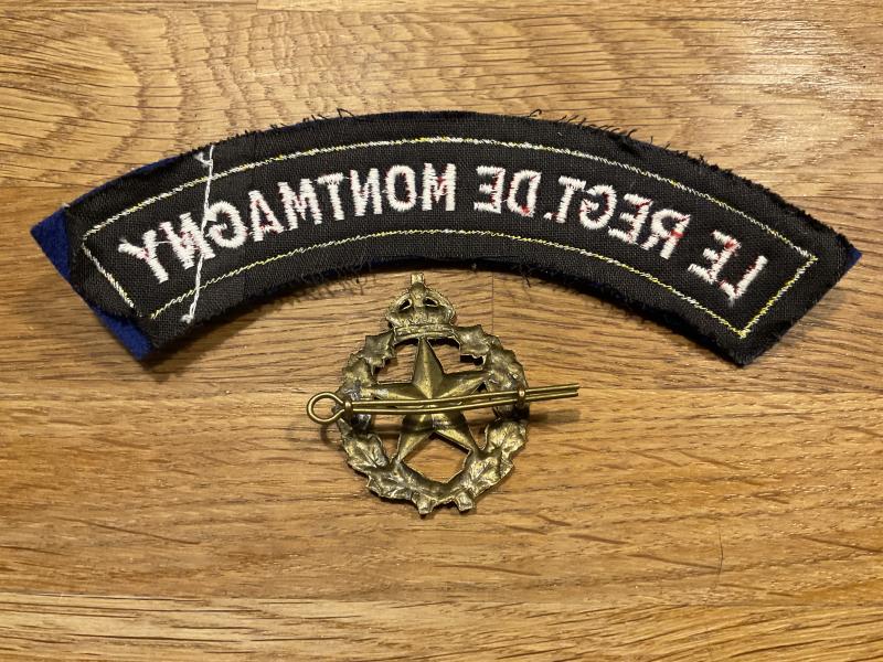 Le Regt.De Montmagny cap badge & shoulder title.