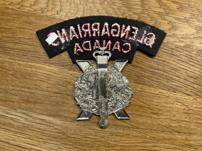 The Stormont, Dundas & Glengarry Highlanders cap badge & title.