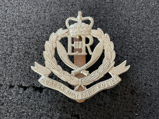 Gradia Militaria -  Post 1952 Gurkha Military Police w/m cap badge.